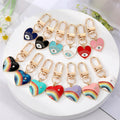 Gold Tone Colorful Enamel Heart Eye and Rainbow Clip Keychains view 1