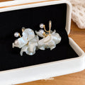 White Petal and Pearl Cluster Clip Earrings for Everyday Styling view 2