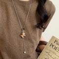 Wood Horse Pearl Tassel Cord Necklace with Distinctive Textured Details view 3