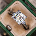 Silver Tone Asscher Cut CZ Ring With Round Side Stones view 1