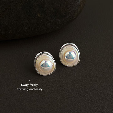 Silver Tone Irregular Oval White Pearlescent Center Stud Earrings