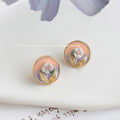 Gold Tone Peach Round Disc White Flower And Green Leaf Stud Earrings view 3