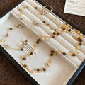 Brown Beaded Layered Necklace With Gold Tone Chain Accents view 2