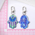 Silver Tone Printed Hamsa Acrylic Clip Keychains in Five Designs view 4