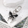 Silver Tone Crystal Winged Fairy Clip Keychains in Five Colors view 6