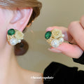 Mixed Metal Floral Stud Earrings With White Pearl Centers view 4