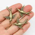 Antique Bronze Flying Swallow Two Loop Connector Charms view 1