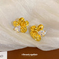 Gold Tone Sculpted Folded Petal Flower Stud Earrings view 4