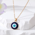 Gold and Silver Tone Navy Evil Eye Earrings and Necklaces view 4