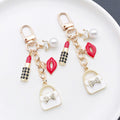 White Pink Red and Black Fashion Charm Keychains with Metal Hardware view 2