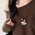 Brown Cord Long Necklace With Silver Tone Ginkgo Leaf Pendant view 6