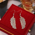 Gold Black Rose Gold and Silver Open Feather Hook Earrings view 4