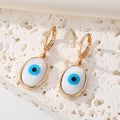 Gold Tone White Shell Round Heart and Hamsa Eye Huggie Earrings view 7