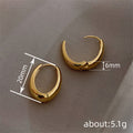 Gold Tone Smooth Chunky Oval Huggie Hoop Earrings Pair view 4