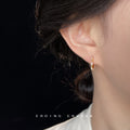 Gold Thin Huggie Hoop Bottom Crystal Row Earrings Pair view 3