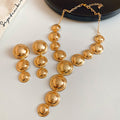 Polished Metal Disc Cascade Necklace Earring Set Pair view 6