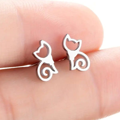 Front product view of open cat stud earrings in four metallic tone finishes