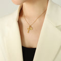 Cross and Oval Medal Pendant Necklace Gold Steel Tones view 7