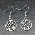 Snowflake and Star Round Drop Earrings in Silver Tone view 1