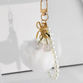 Faux Fur Pompom Charm With Pearl Beaded Strap And Bow view 8