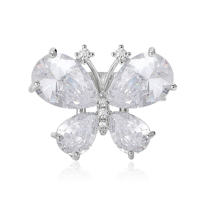 Clear Crystal Butterfly Brooch In Two Metal Tones With Polished Metal Detail