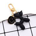 Gold Tone Balloon Dog and Smile Disc Clip Keychains view 9
