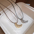 Black Cord Silver Croissant Bun Adjustable Pendant Necklace view 2