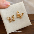 Sculpted Openwork Butterfly Stud Earrings in Gold Tone view 1