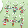Christmas Charm Keychains Featuring Silver Santa Across 41 Pictured Variations view 1