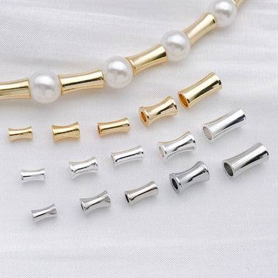 Metal hourglass spacer beads in five sizes arranged as a full product overview