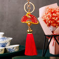 Red Enamel Dragon Fan Tassel Keychain with Gold Tone Hardware view 1