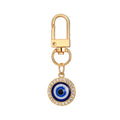 Twelve Piece Gold Tone Rhinestone Evil Eye Clip Keychain Set view 4