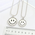 Silver Tone Reversible Smiley and Frown Spinner Pendant Necklaces view 2