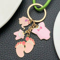 Pink and Blue Baby Elephant Bottle and Footprint Charm Keychain Pair view 3