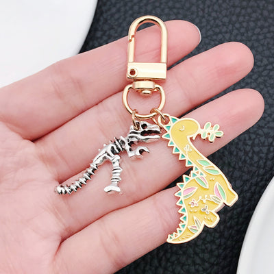 Main display of yellow or blue long neck dinosaur skeleton keychains