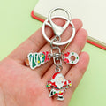 Christmas Charm Keychains Featuring Snowman Across 81 Pictured Variations view 1
