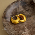 Gold Tone Brushed Matte Chunky Huggie Hoop Earrings view 3