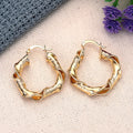 Twisted Cutout Hoop Earrings in Gold-Tone Metal Jewelry view 5