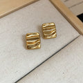 Crinkled Geometric Stud Earrings in Gold and Silver view 10