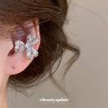 Crystal Clover Ear Clip with Silver Tone Setting and Clear Stones view 3