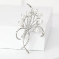 Pearl Floral Branch Bow Brooch With Faceted Crystals And Polished Metal Details view 4