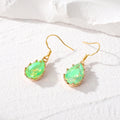 Gold Tone Faceted Iridescent Teardrop Crystal Hook Earrings in Nine Colors view 7