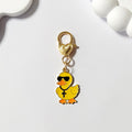 Gold Tone Yellow Duck Heart-Clasp Charms in Twelve Playful Designs view 12