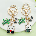 Panda Charm Keychains Featuring White Flower Across 45 Pictured Variations view 2