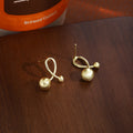 Brushed Gold Tone Loop and Ball Small Stud Earrings view 3