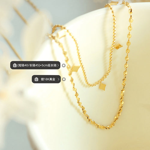 Gold dual-chain necklace close-up with length and plating labels