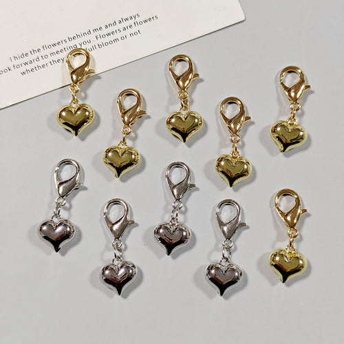 Main product view of puffy Heart Lobster-Clasp Charms in Gold and Silver Tone