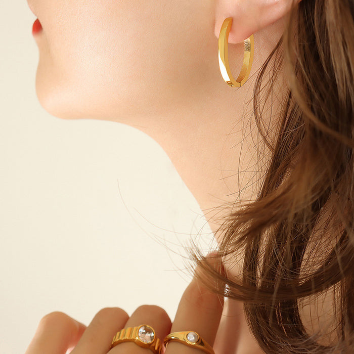 Flat Oval Huggie Hoop Earrings Gold And Steel Tone Metal