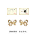 Gold Tone Clear Stone Ribbon Bow Earrings In Stud And Clip Styles view 3