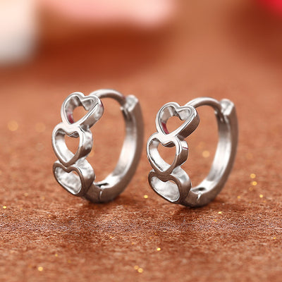 Alternate product view of silver tone linked open heart hoop earrings with polished finish